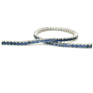 18kt witgouden tennis armband met saffier.